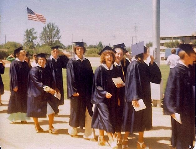 Graduates: Rita Castorena, Joe Harrington, Kane Cassidy, and a laughing Thank God this is over Leslie Feducia  (photo from Leslie Feducia Louvier)
