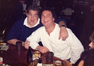Mike Ashen was the first classmate to celebrate his 50th birthday! In January his wife threw a big Roast in his honor with many friends in attendance.  This is an archival photo (Dec.86) of Mike and buddy Jeff Ashton at the Bus Stop Saloon in San Francisc